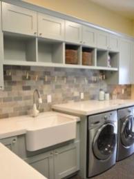 Gorgeous laundry room with plenty of storage and counter-top space